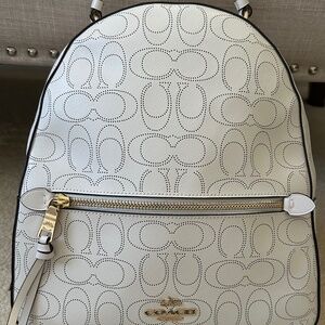 Coach light cream colored leather backpack